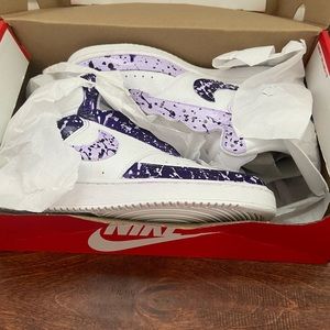 I am selling women’s customized purple Nike court vision mids.